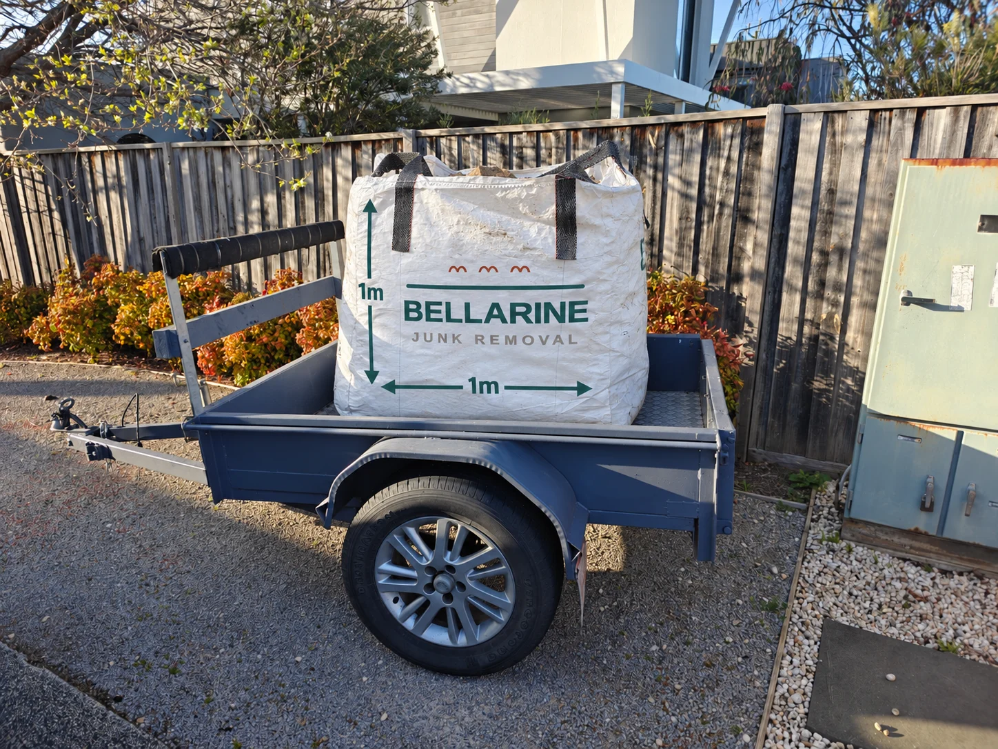 A full Bellarine Junk Removal 1m³ bag on a trailer.